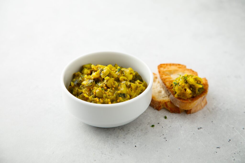 Traditional cucumber relish with baguette bread